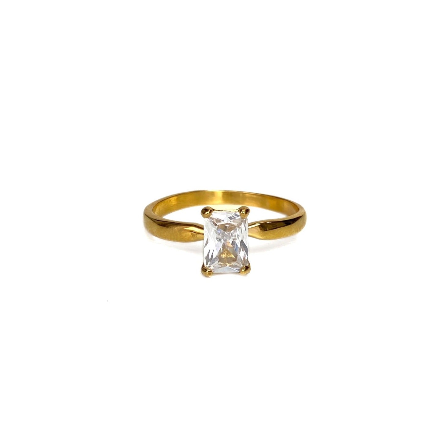 gold band ring with clear zircon stone