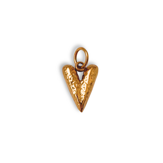 Gold textured heart-shaped pendant on a white background